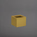 Cuba Low Corner Fiberglass Planter in gloss metallic gold against gray background.