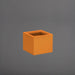 Cuba Low Corner Fiberglass Planter in gloss tangerine against gray background.