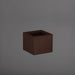 Cuba Low Corner Fiberglass Planter in matte dark brown against gray background.