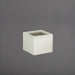Cuba Low Corner Fiberglass Planter in satin beige against gray background.