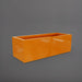 Cuba Low Rectangle Fiberglass Planter in gloss tangerine against gray background.