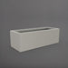 Cuba Low Rectangle Fiberglass Planter in matte cement grey against gray background.
