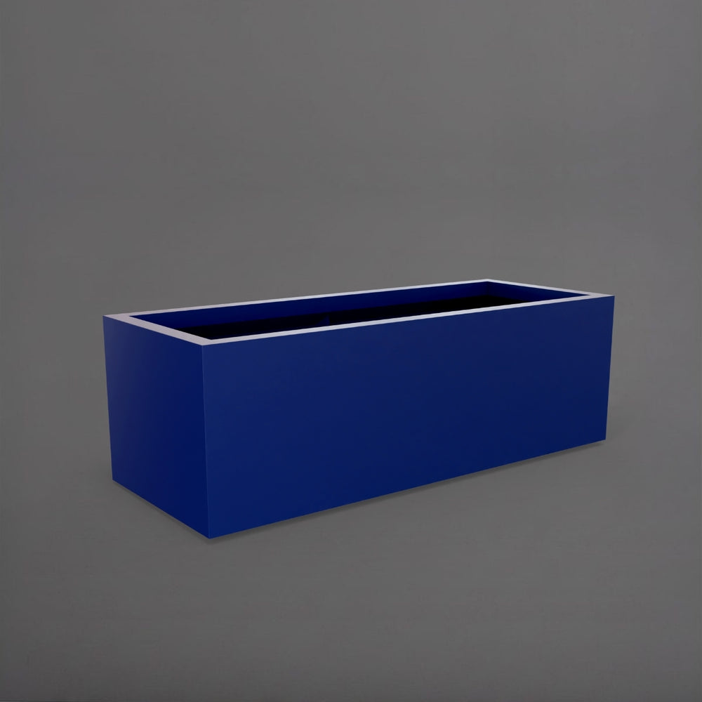 Cuba Low Rectangle Fiberglass Planter in matte cobalt blue against gray background.
