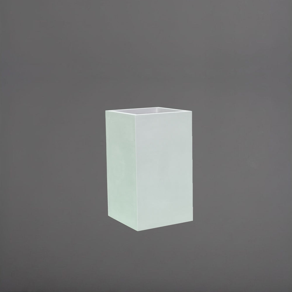 Darwin Tall Corner Fiberglass Planter in gloss bright white against gray background.