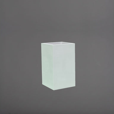 Darwin Tall Corner Fiberglass Planter in gloss bright white against gray background.