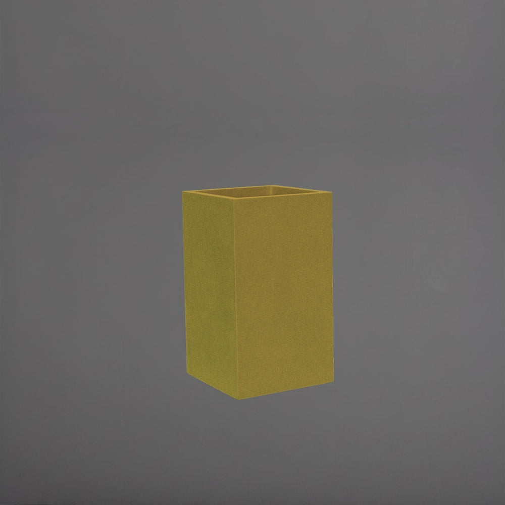 Darwin Tall Corner Fiberglass Planter in gloss metallic gold against gray background.