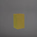 Darwin Tall Corner Fiberglass Planter in gloss metallic gold against gray background.