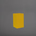 Darwin Tall Corner Fiberglass Planter in gloss saffron against gray background.