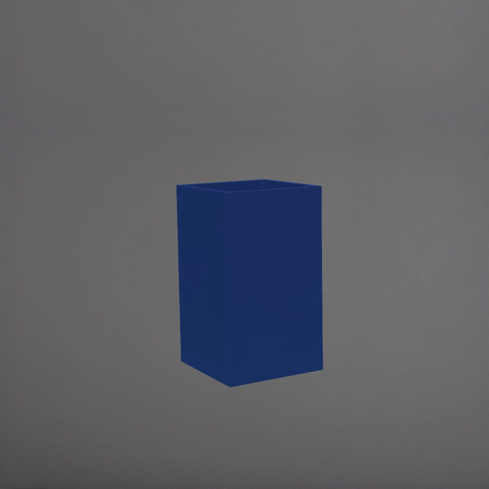 Darwin Tall Corner Fiberglass Planter in matte cobalt blue against gray background.