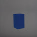 Darwin Tall Corner Fiberglass Planter in matte cobalt blue against gray background.