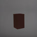 Darwin Tall Corner Fiberglass Planter in matte dark brown against gray background.