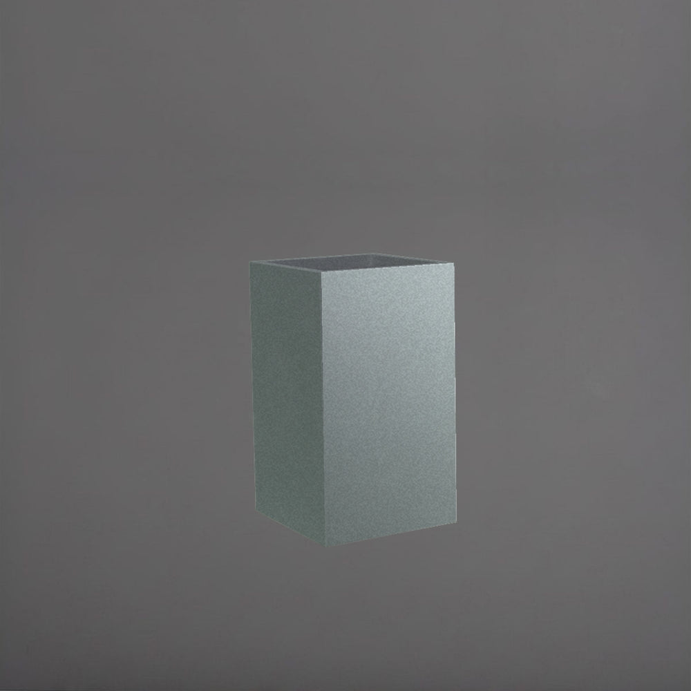 Darwin Tall Corner Fiberglass Planter in matte gunmetal against gray background.