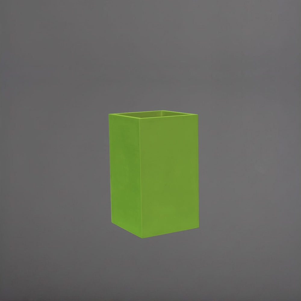 Darwin Tall Corner Fiberglass Planter in satin green against gray background.