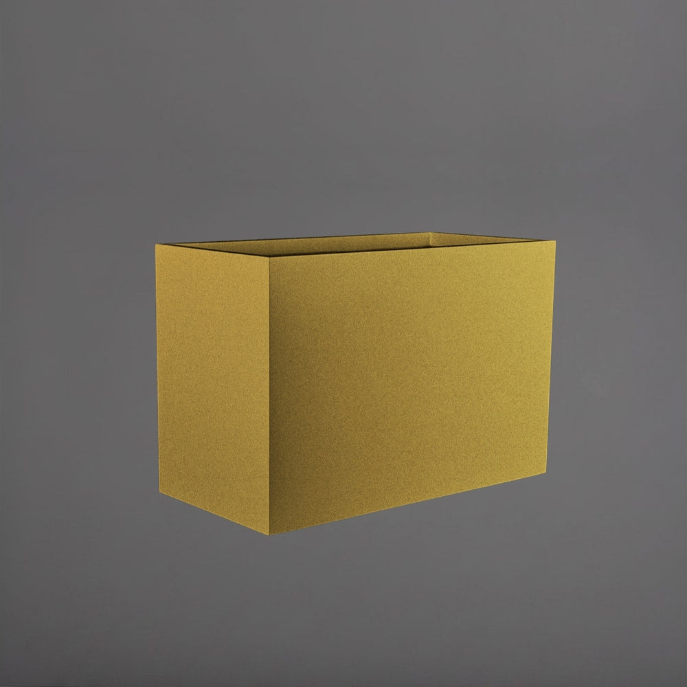 Darwin Tall Rectangle Fiberglass Planter in gloss metallic gold against gray background.