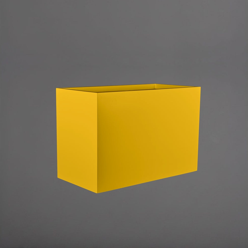 Darwin Tall Rectangle Fiberglass Planter in gloss saffron against gray background.