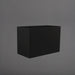 Darwin Tall Rectangle Fiberglass Planter in matte black against gray background.
