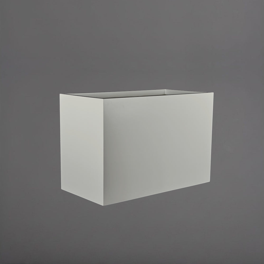Darwin Tall Rectangle Fiberglass Planter in matte cement grey against gray background.