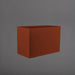 Darwin Tall Rectangle Fiberglass Planter in matte terra cotta against gray background.