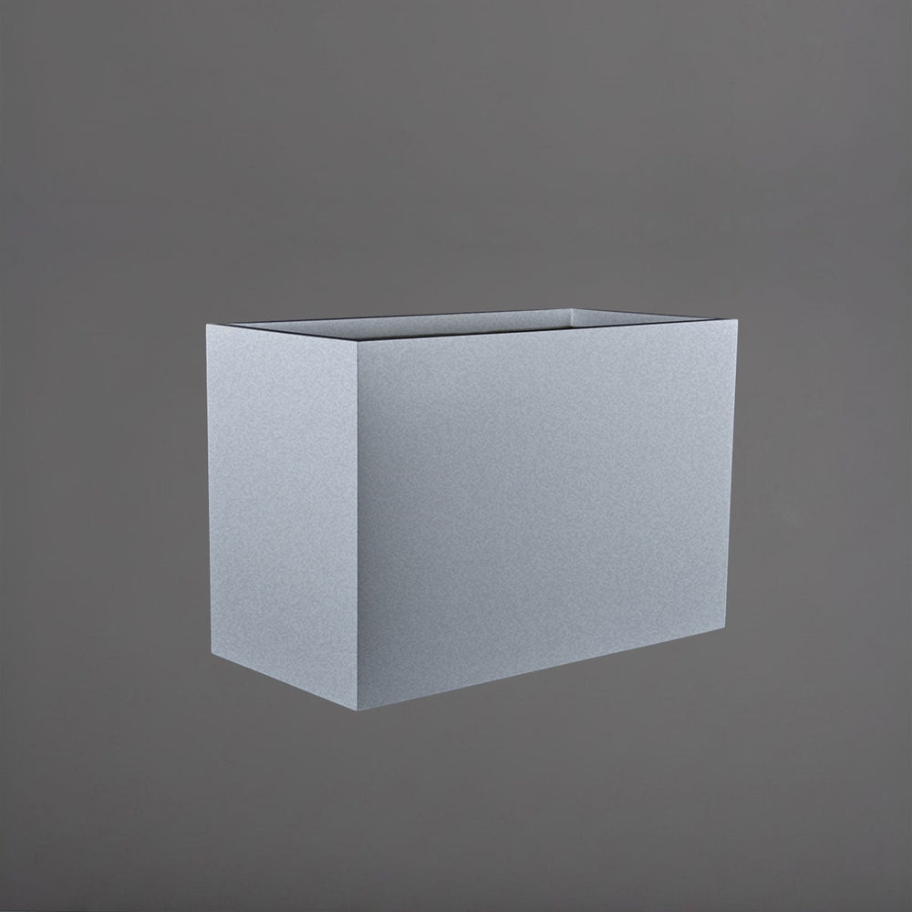 Darwin Tall Rectangle Fiberglass Planter in metallic silver against gray background.