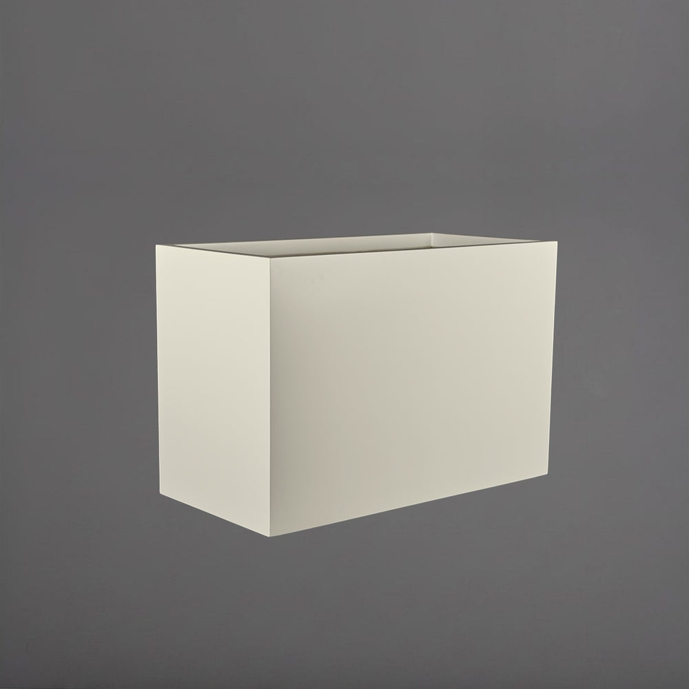 Darwin Tall Rectangle Fiberglass Planter in satin beige against gray background.