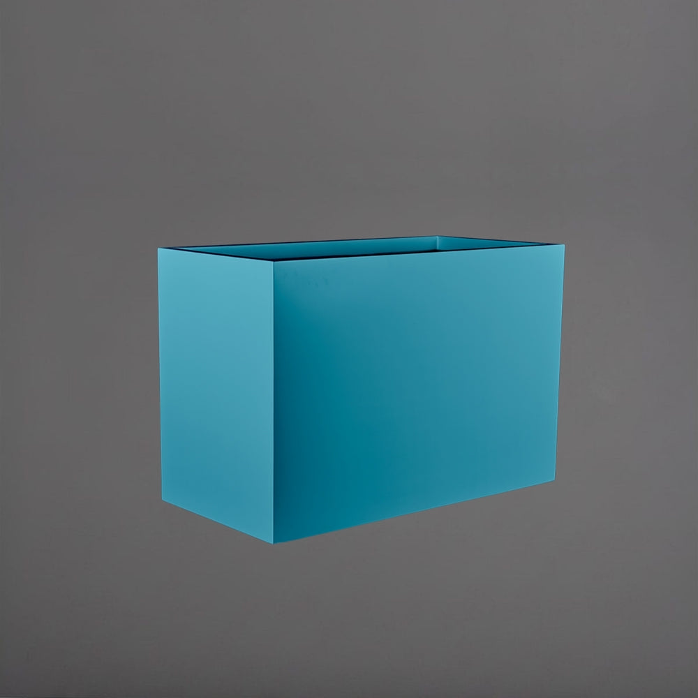 Darwin Tall Rectangle Fiberglass Planter in satin seafoam green against gray background.