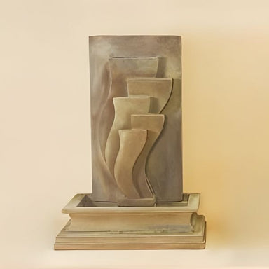 Deco Wall Fountain against brown background.