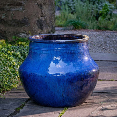 Del Corso Planter - Riviera Blue - S/1 on concrete in the backyard