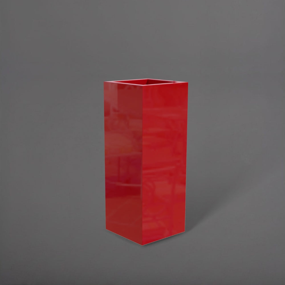 Delray Tall Corner Fiberglass Planter in gloss red against gray background.