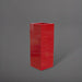 Delray Tall Corner Fiberglass Planter in gloss red against gray background.
