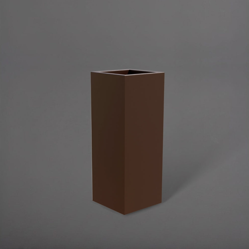 Delray Tall Corner Fiberglass Planter in matte dark brown against gray background.