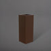 Delray Tall Corner Fiberglass Planter in matte dark brown against gray background.