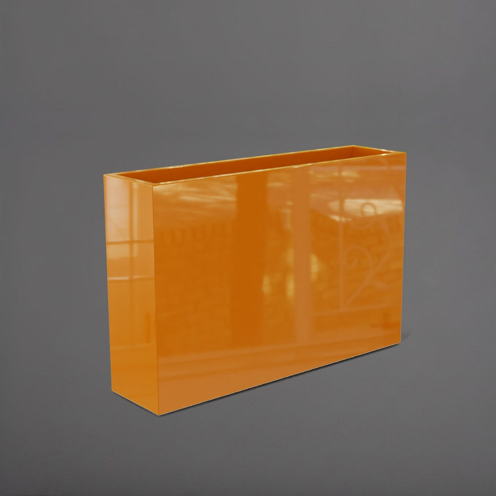 Delray Tall Rectangle Fiberglass Planter in gloss tangerine against gray background.