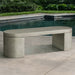 Dorchester Bench on concrete near a swimming pool.