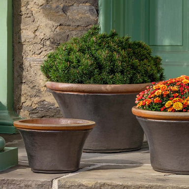 Enfield Planter - Graphite - S/3 filled with plants in the backyard