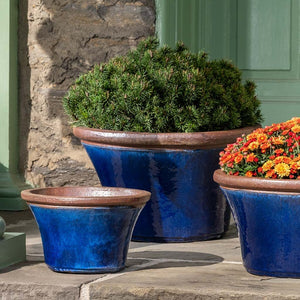 Enfield Planter - Riviera Blue - S/3 filled with plants in the backyard