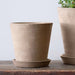 Essential Planter, Medium in brown against white background