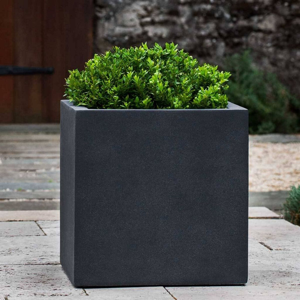 Farnley Planter 1818 S/1 in lead lite on concrete filled with plants.