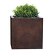 Farnley Planter 1818 S/1 in rust lite filled with plants against white background.