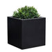 Farnley Planter 2828 S/1 in onyx black lite  filled with plants against white background.