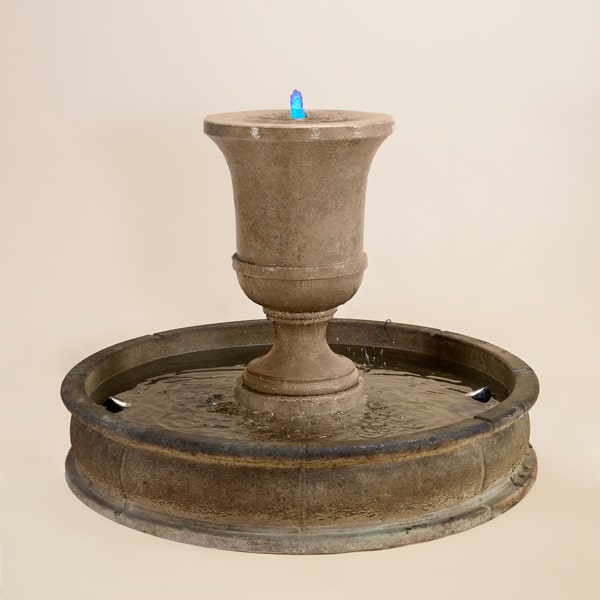 Fascea Urna Fountain against brown background.