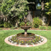 Fleur de Lis Pond Fountain in action in the garden. 