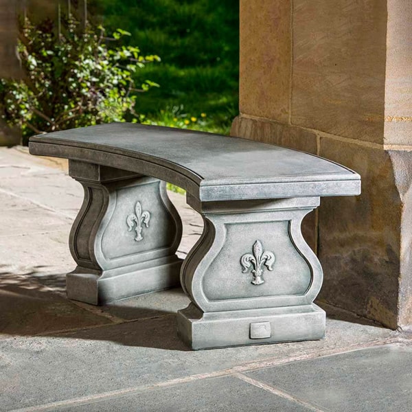 Fleur De Lys Curved Bench on concrete in the hallway