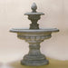 Fontana Grande Fountain against brown background.