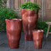 Foxglove Planter, Tall in Brunello on concrete in the backyard.