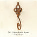 Gi-110 Iron Rustic Spout against brown background.