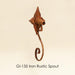 GI-135 Iron Rustic Spout against brown background.