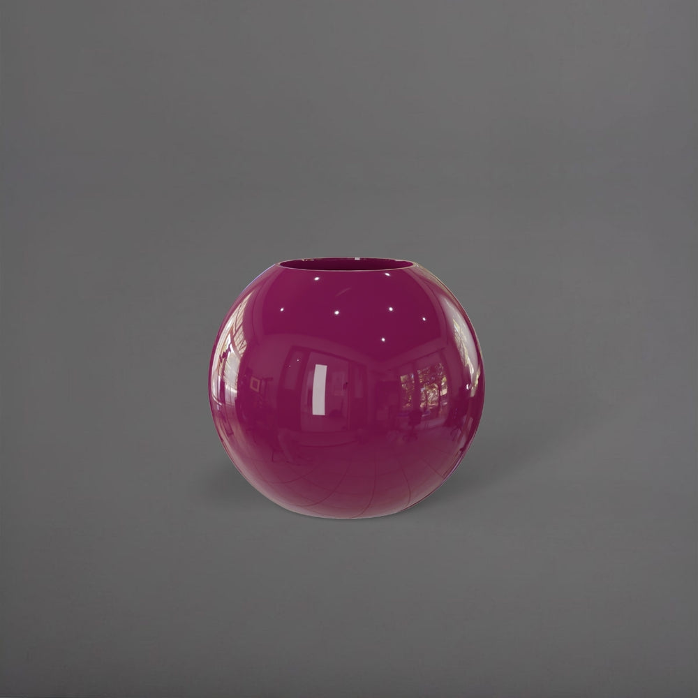 Globe Fiberglass Planter in gloss eggplant against gray background.
