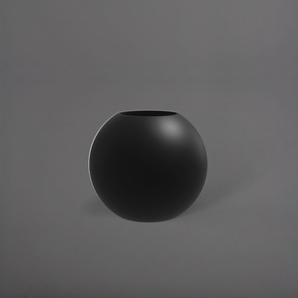 Globe Fiberglass Planter in matte black against gray background.