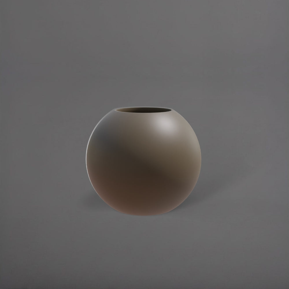 Globe Fiberglass Planter in matte bronze against gray background.