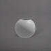 Globe Fiberglass Planter in matte cement grey against gray background.